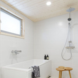 LED downlight installed over a bathtub. Mix series by Arkoslight | Aiure