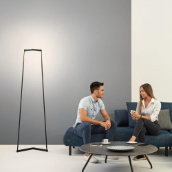 Minimal floor lamp by Mantra placed in the living room | Aiure