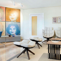 Zen Tube Surface indoor LED spotlight illuminating a living room | Aiure