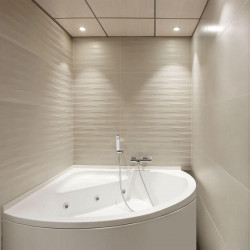 2 Arkoslight Bath downlights switched on in a bathroom | Aiure