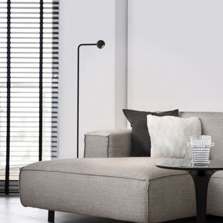 Eyes minimalist adjustable floor lamp by Mantra in a living room | Aiure