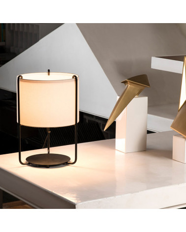 Drum table lamp on a table | Aiure