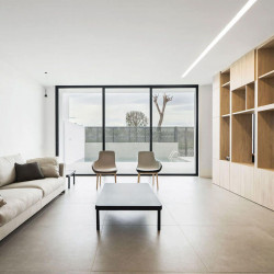 Linear lighting system LED Downlight Fifty HO Trimless in a living room. Arkoslight | Aiure