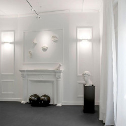 Two Rec Double Mini wall sconces in a gym. By Arkoslight | Aiure
