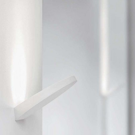 Close-up of two white wall sconces from the Flap series by Arkoslight | Aiure