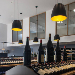 Black and gold pendant ceiling lamp in a wine bar from the Salt series by Arkoslight | Aiure