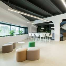 Fifty Suspension pendant lamp by Arkoslight in the break room of an office | Aiure