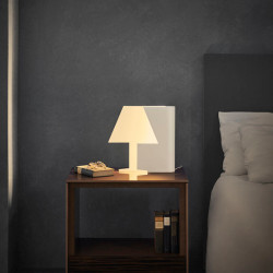 Lamp on a bedside table. Book Collection by Mantra | Aiure