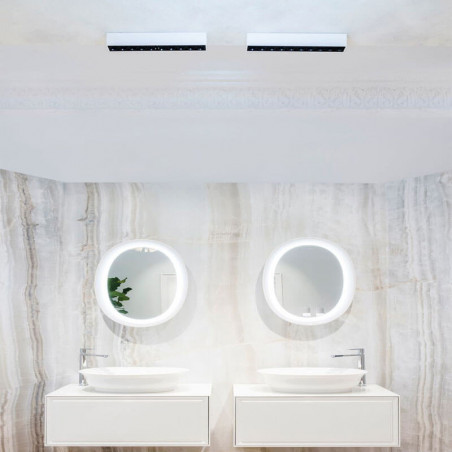 2 ceiling lamps Black Foster Surface by Arkoslight over a sink in a bathroom | Aiure
