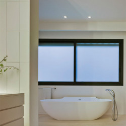 2 Arkoslight Bath Square downlights switched on in a bathroom | Aiure