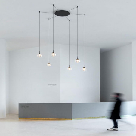 Alaska Fancy Shape by Arkoslight with several lights installed in the hall of a building | Aiure