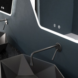 Mare polygonal touch LED mirror by Eurobath in a bathroom close up | Aiure