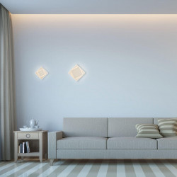 Mantra Dakla flat effect wall sconces white small and medium in a living room| Aiure