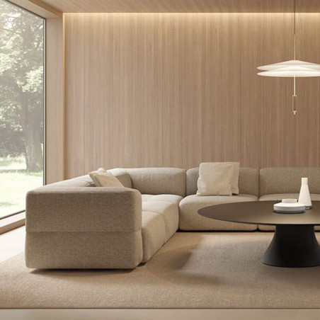 Sand coloured sofa from Viccarbe's Savina collection in a living room| Aiure